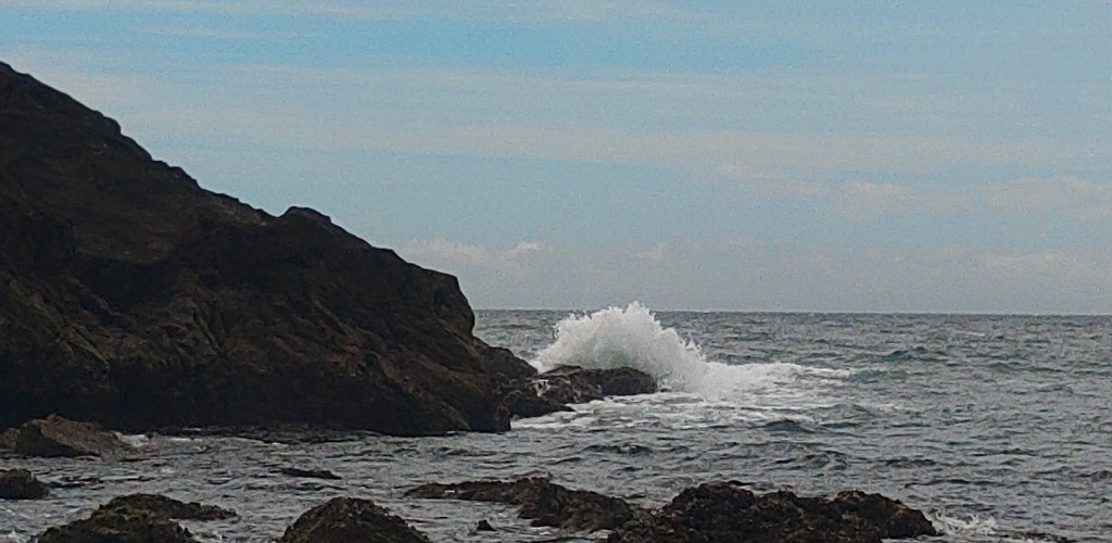 waves bouncing on rocks